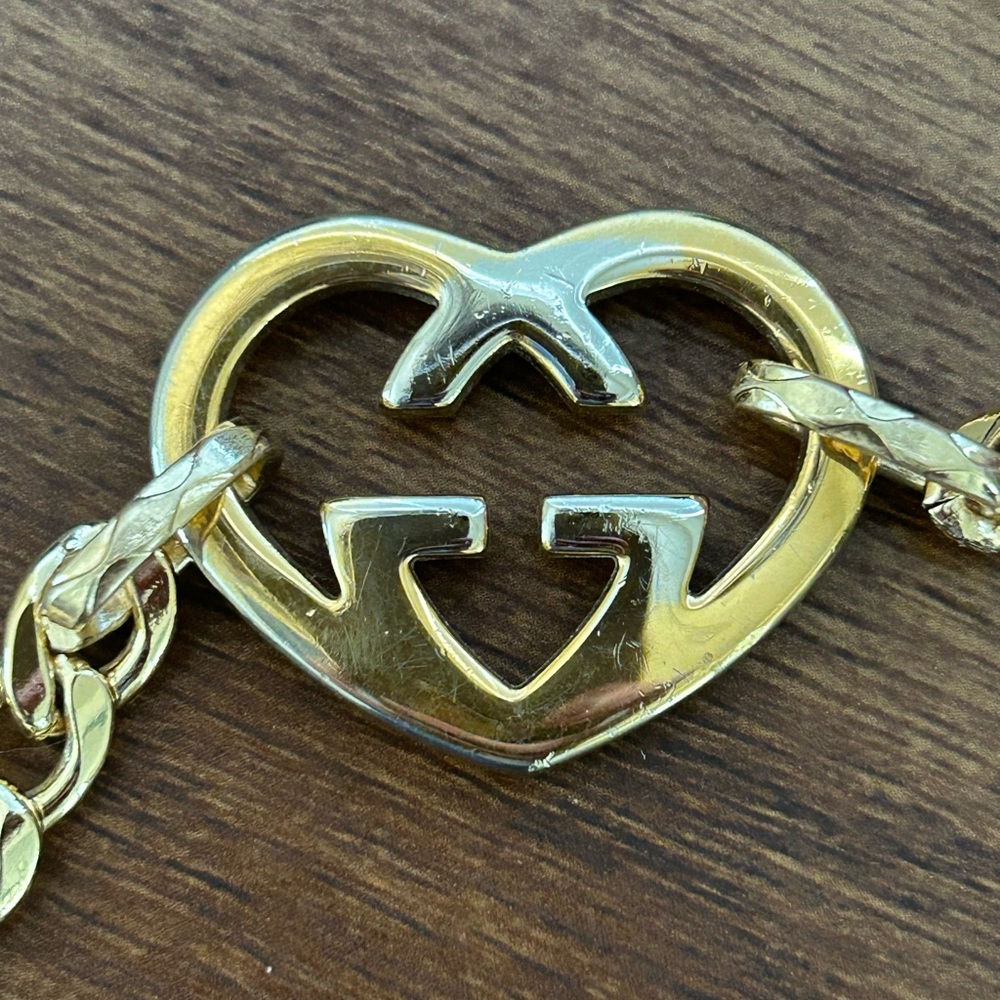Authentic Gucci gold & silver heart charm with unbranded connector rings